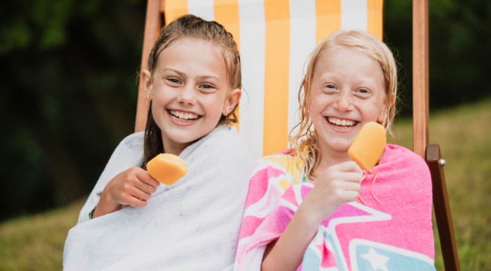 Taking a Summer Vacation From the Digital World Two girls eating popsicles.