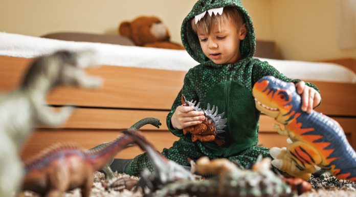 Why My Son’s Obsession with Dinosaurs Makes Me a Better Person A boy playing with dinosaurs.