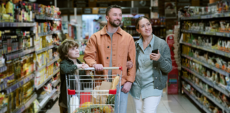 Save Time and Money with Tech-Savvy Grocery Shopping A family grocery shopping.