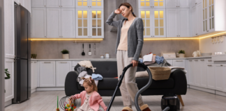 Is It Bedtime Yet? An exhausted mom vacuuming.