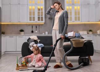 Is It Bedtime Yet? An exhausted mom vacuuming.