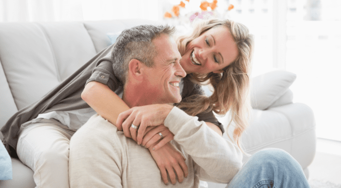 The Key to a Successful Marriage A married couple cuddling.