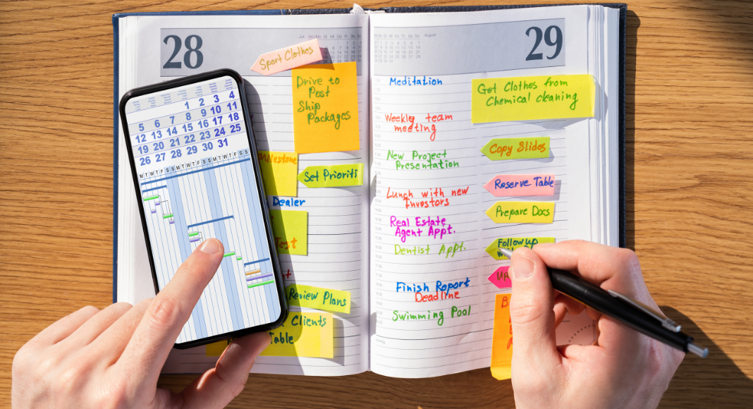 Writing in an agenda book.