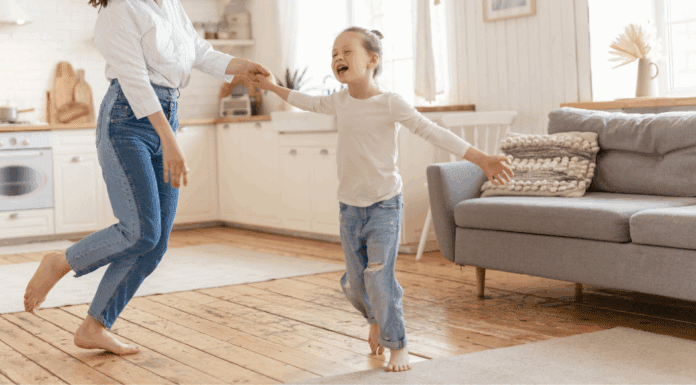 I Wish I Could Be More Like My Daughter A girl dancing in the living room.