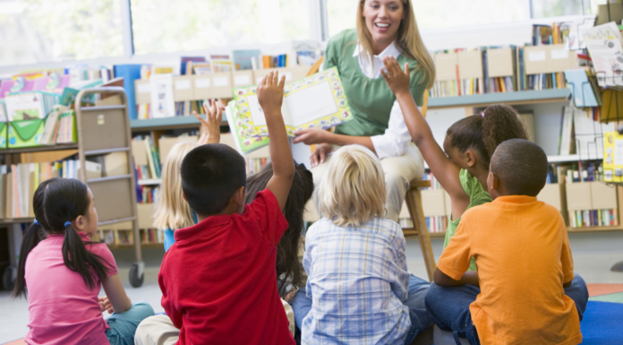 Kindergartners listening to a story.