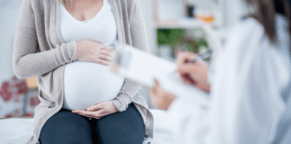 How My Pregnancy Has Made Me Think Twice A pregnant woman at the doctor.