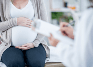 How My Pregnancy Has Made Me Think Twice A pregnant woman at the doctor.