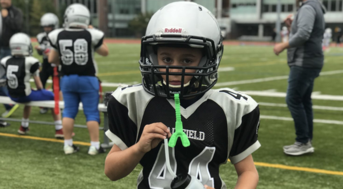 Learning Life Lessons :: Football Matters A boy ready to play football.