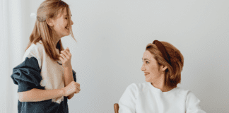A mom and her teen daughter.