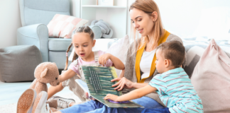 Nanny Taxes Made Easy A nanny reading to children.
