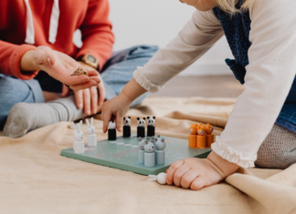 Playing a board game.