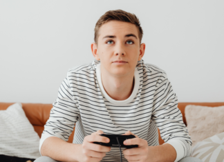 A boy playing video games.