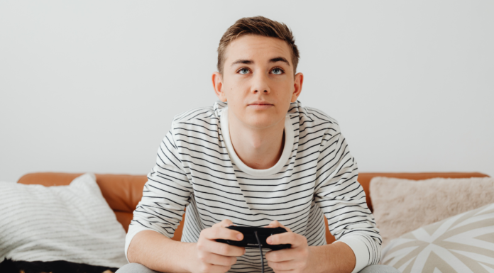 Gamer Leaves the House A boy playing video games.