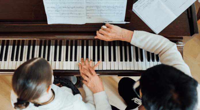 Nurturing Talent at Hubbels Music School Making music on the piano with music lessons.