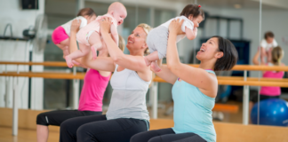 Westchester County Mommy Meetups Women and their babies in a mommy meetup class.
