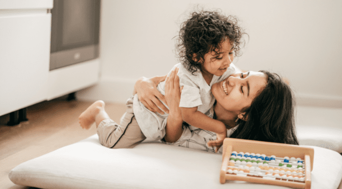 Adapting to Motherhood: Meet Cindy A mom being hugged by her son.