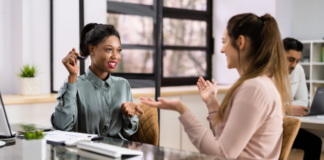 The Best Piece of (Unsolicited) Advice I Got as a Mom A woman giving unsolicited advice.