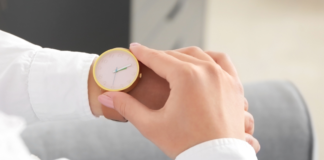 Put Your Extra Day to Use This Leap Year Looking at a watch.