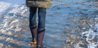 Never Looking Back: Meet Ali A woman walking through water.