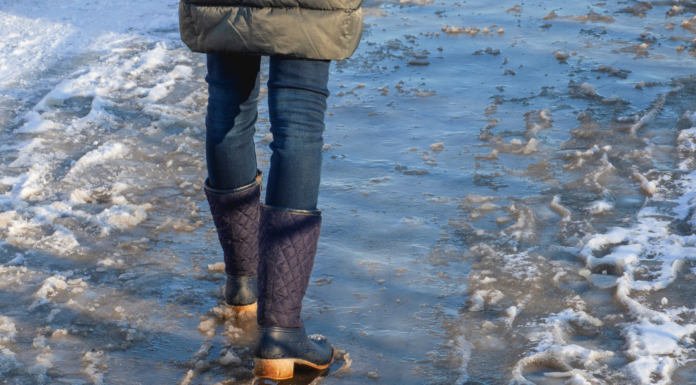 Never Looking Back: Meet Ali A woman walking through water.