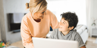 Graduating to the Next Phase of Motherhood: Meet Ruth A mom helping her son on the computer.