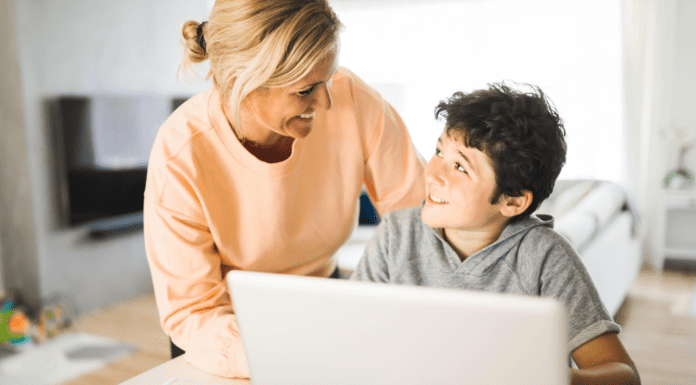 Graduating to the Next Phase of Motherhood: Meet Ruth A mom helping her son on the computer.