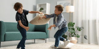 The Truth About Sibling Rivalry Brothers fighting with pillows.