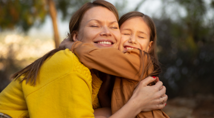 Compassionate Under-Parenting: Meet Lauren A mom hugging her daughter.