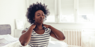 A woman with neck pain.