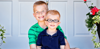 Two brothers sitting together.