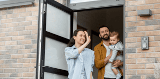A family waving goodbye.