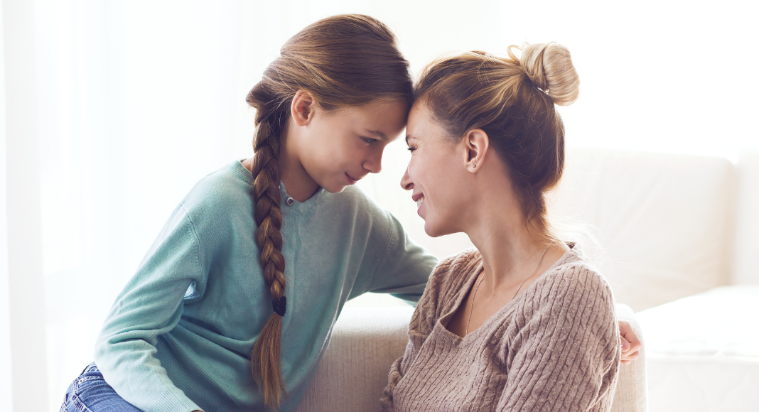 A mom and teen daughter.