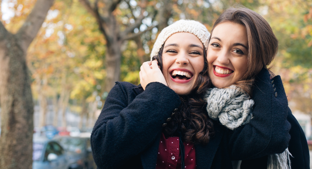 Best friends embracing.