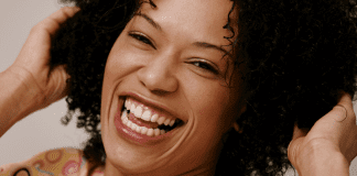 Take Some Time to Laugh Today A woman laughing.