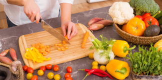 Best Pre-Cooking Hacks for Every Busy Mom Chopping vegetables.