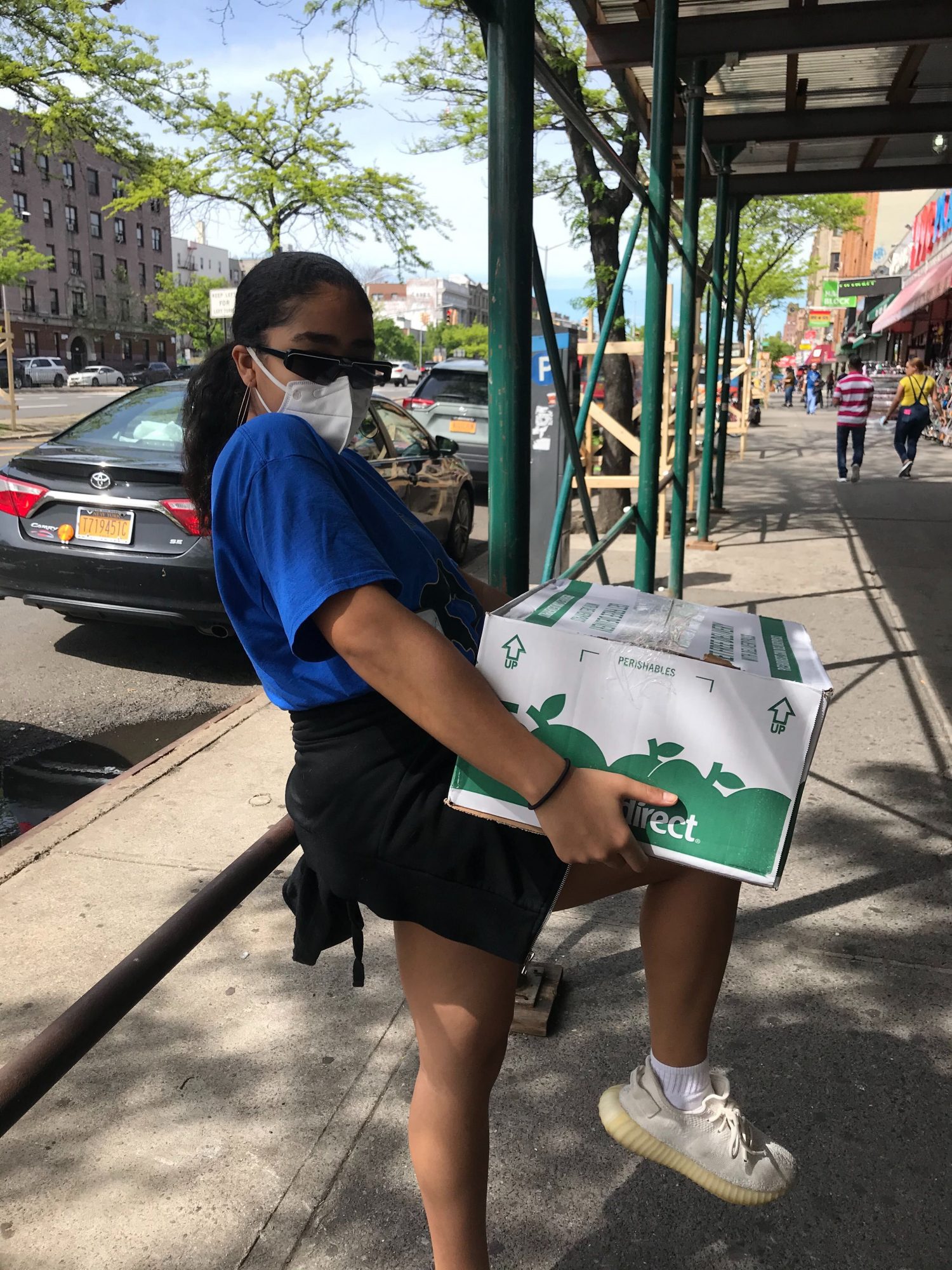 A woman delivering groceries.