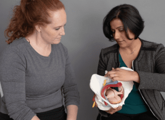 A woman demonstrating how the bladder works.