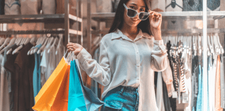 A girl carrying shopping bags.