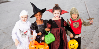 Children wearing Halloween costumes.