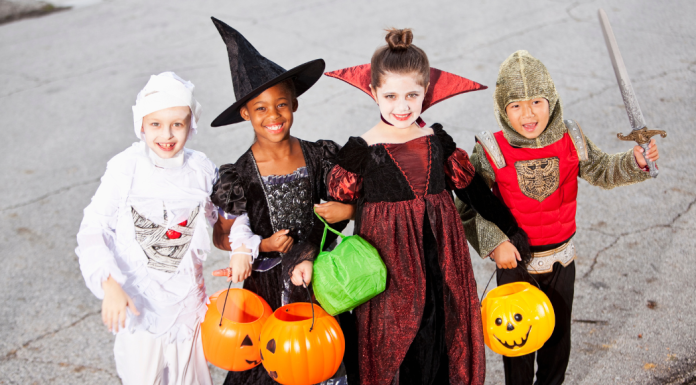 Children wearing Halloween costumes.