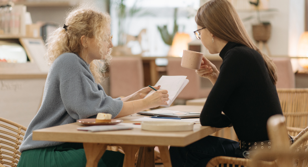 Two women having a conversation.
