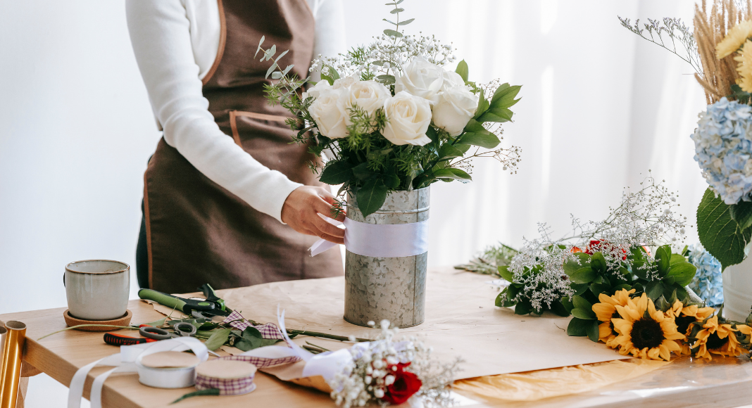 A florist making a bouquet. 