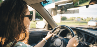 Break Free From Living on Autopilot A woman behind the steering wheel of a car.
