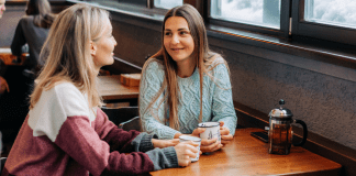 You’re My “Go-To Rational Friend” Two women having coffee.