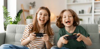 Kids today playing video games.