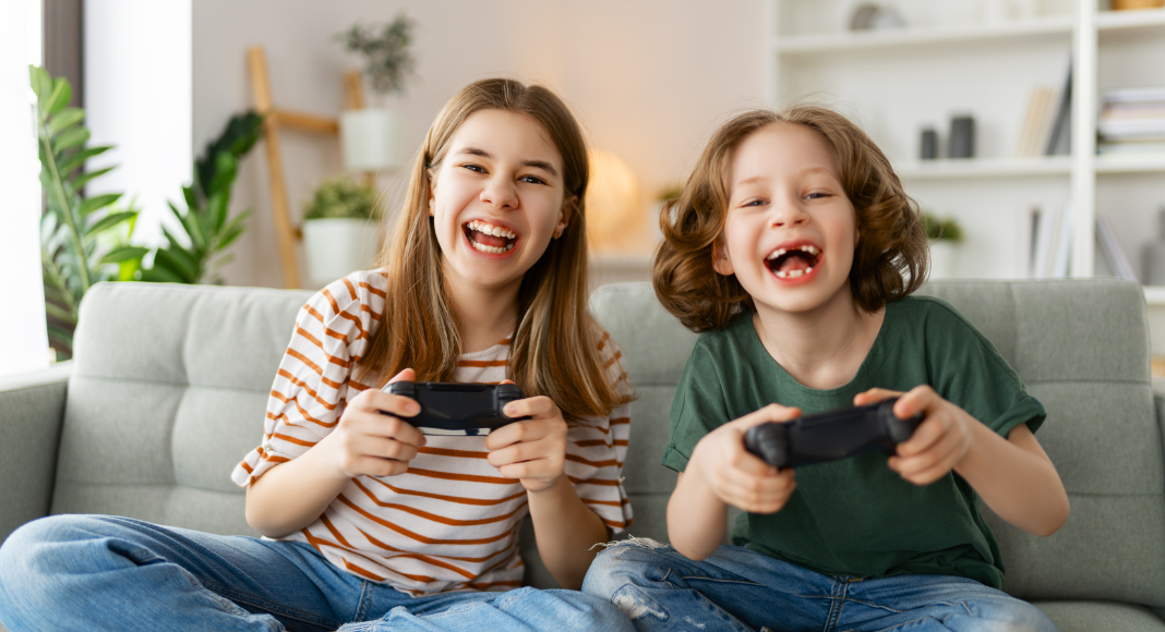 Kids today playing video games.