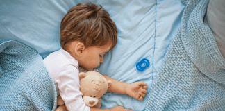 A toddler sleeping.