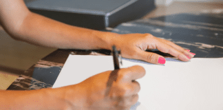 Writing a letter.