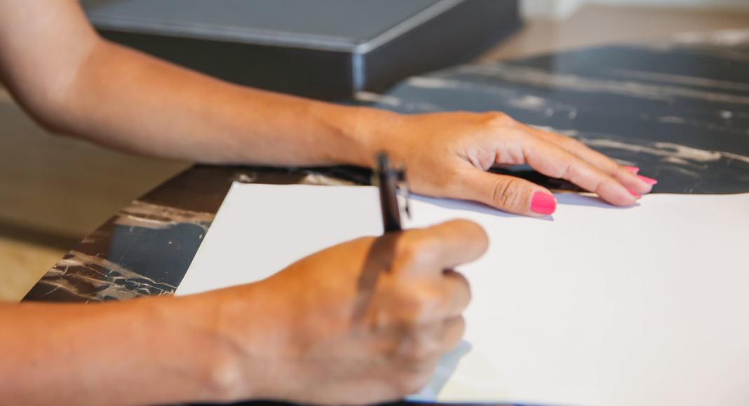Writing a letter.