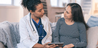 I’m So Proud of Myself This Mother’s Day A woman speaking with a doctor.